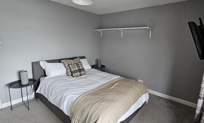 The Redford Cwtch Lounge – a cosy, welcoming space with soft seating, warm lighting, and rustic charm, perfect for relaxing with family or friends aft